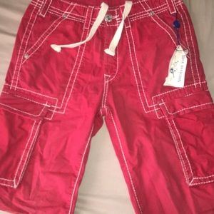red jeans with white stitching